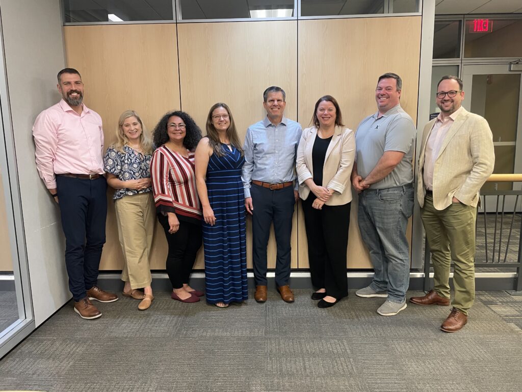 SHARE Research Leadership Cohort 1” (from left: Michael Kavulic, Kent State University; Susan Zimmerman, Ohio Wesleyan University; Bianka Hernandez, NEOMED; Hillary Snyder, Ohio University; Benjamin Ward, Cleveland State University; Kristen Krupa, University of Dayton; Scott Breloff, Xavier University; and Joel Morales, Case Western Reserve University
